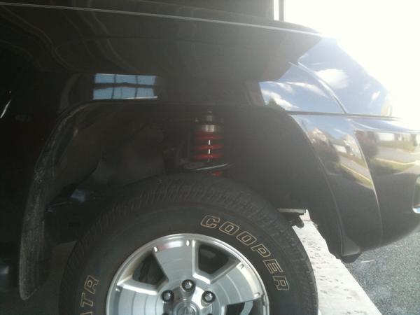 Heres a crappy pic of the toytec adjustable coilover