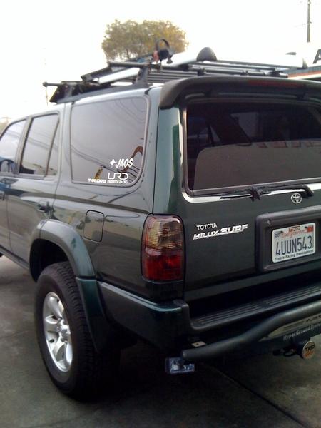 Hilux spoiler  , rear Jaos bumper guard , Safari rack , smoked tail lights.