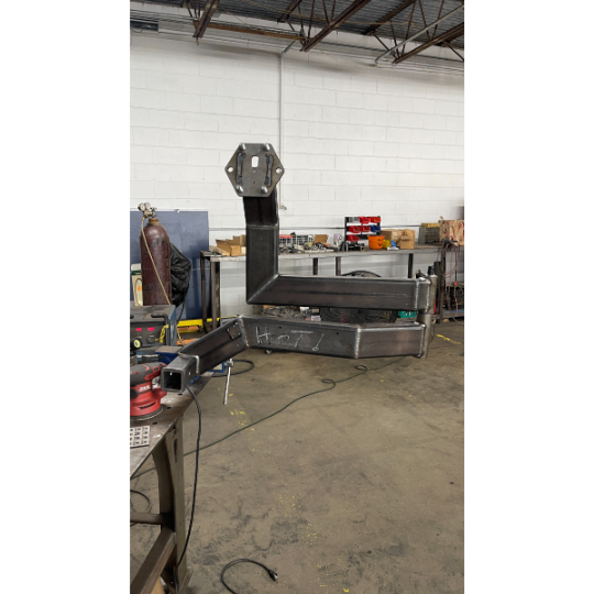 Hitch Mounted Swing Arm Tire Carrier - Progress First Unit