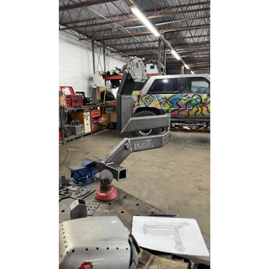 Hitch Mounted Swing Arm Tire Carrier - Progress First Unit