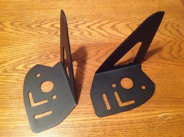 I bought these side mirror light brackets from Yodateq. They're made for FJ80's, so I'll either modify these or build some of my own using these as a 