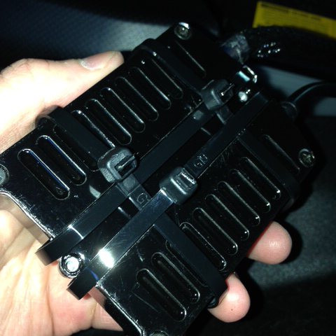 I really didn't want to drill holes into my brand new car so for now I secured the ballasts with zip ties to the body.