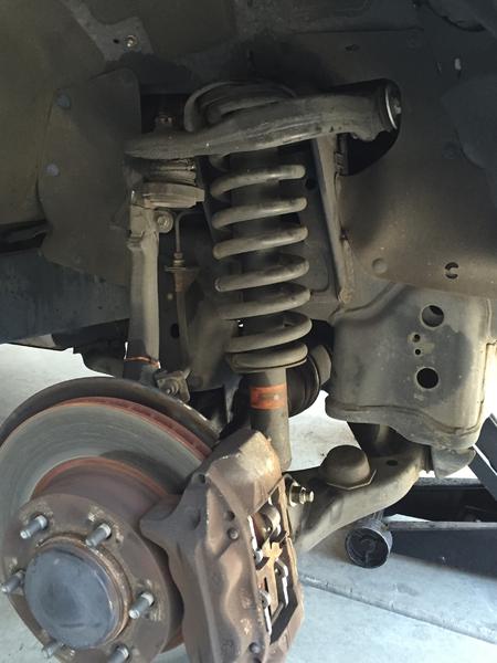 I removed the the strut castle nut but not the 3 strut mount nuts then made marks on the eccentric washer on all 4 lower control arm bolts. Removed th