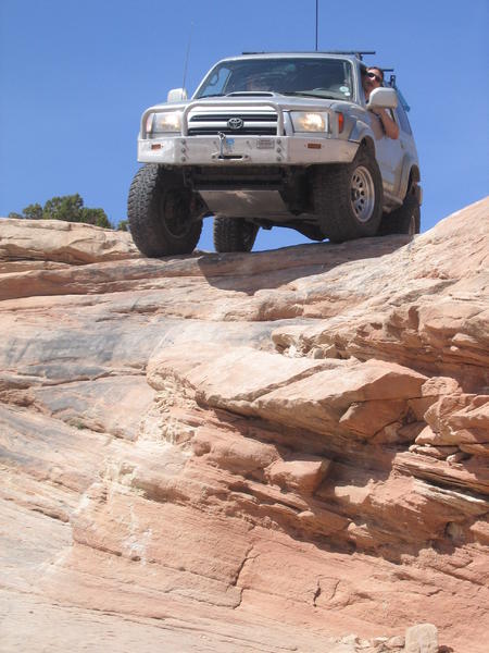 I think this was on Seven Mile Rim in Moab. Just a fun optional obstacle to go down and back up.