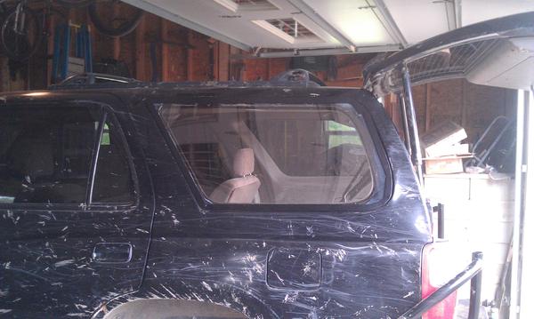 IMAG0394. New rear lexan window and custom 1/8x 1inch  steel window frame.