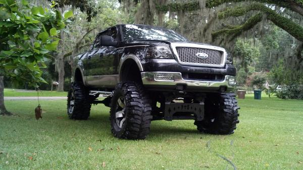IMG 20130805 193538 108
My mans truck total of 21 inches of lift on 44 boggers and 20inch rockstars... Svt motor....