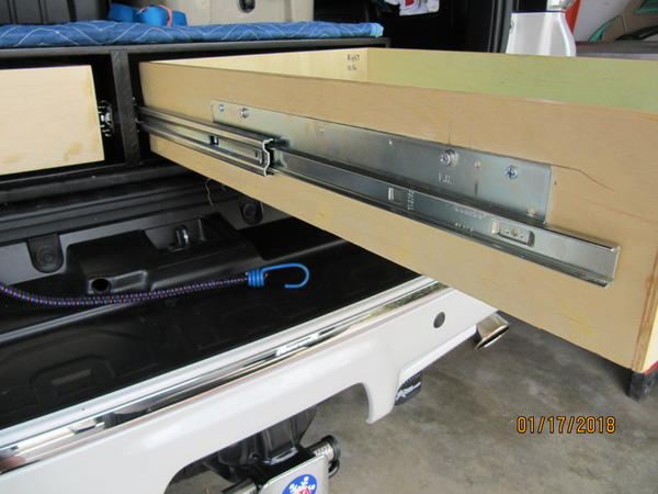 IMG 5325 accuride 3640 28" 200 lb glides. the drawers are removable. nice feature if something fall behind the drawer.