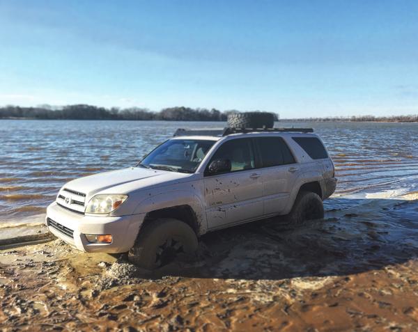 Impromptu trail ride ended in less than 10 minutes. Stuck almost to the axles in white clay on the bank of the Tennessee River in Decatur, AL.