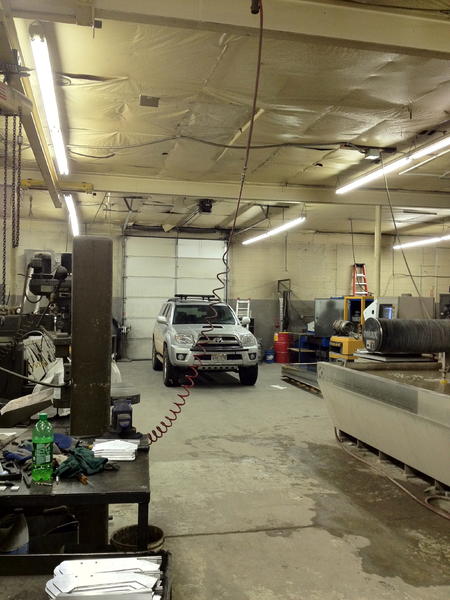 Inside Ricochet, getting the skid fitted
