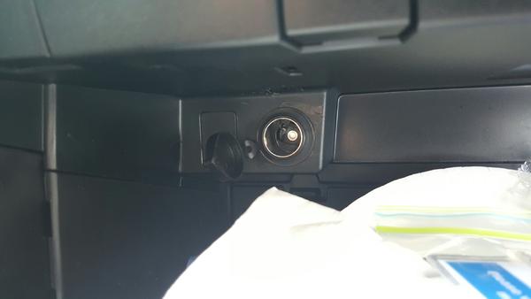 Installed constant power accessory outlet in glove box.