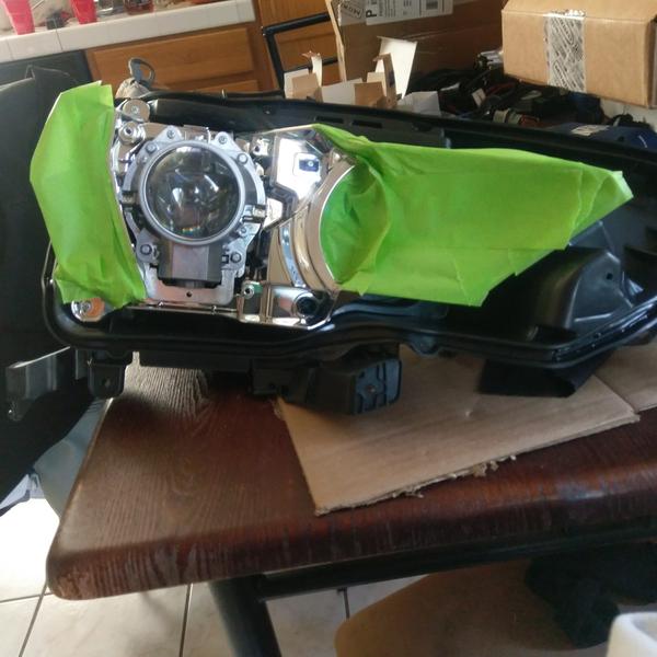 Installed in the headlight assembly with the brackets.