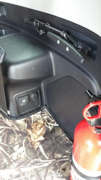 Installed plastic cleats on each side of the trunk to tie bags down or tie up dog leashes easier
