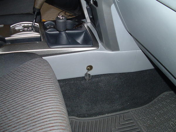 Installed socket with rubber cover open