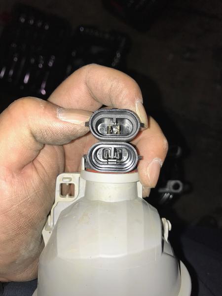 Installing the Morimoto XB (Oval) LED fog lights. After inserting the pins with the supplied connector, spread or pry the pins further apart so it can