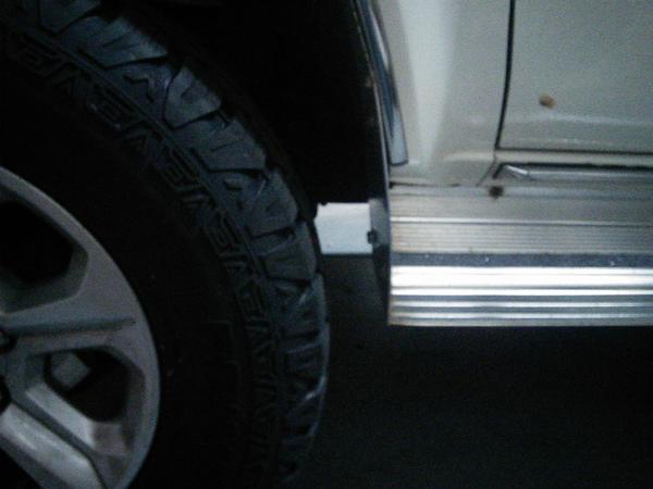 It clears until you turn, then it gets real tight on the step. Plenty of clearance to the actual body.