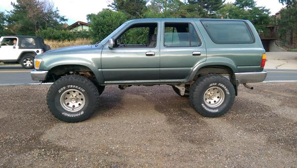 It took three weekends of grueling battle, but I managed to swap the tranny. Changed all fluids, tracked down a coolant leak, new battery, stuffed 35"