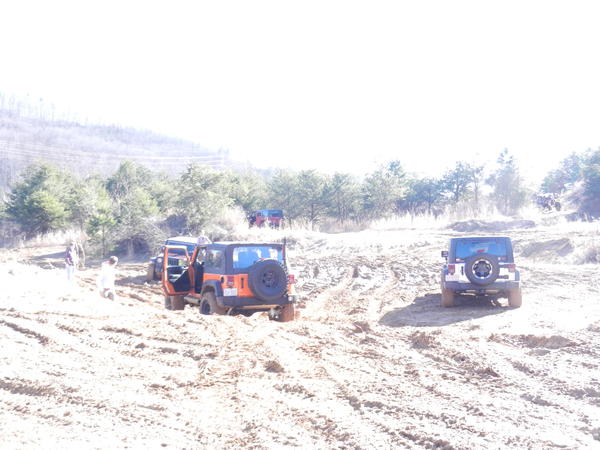 Jeeps pulling out Jeeps