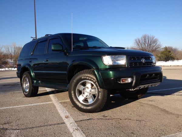 Just got the 265/75/16s on there, with some TRD FJ Cruiser wheels, I really like this set up, also put in white parking lights and the Tacoma Skid Pla
