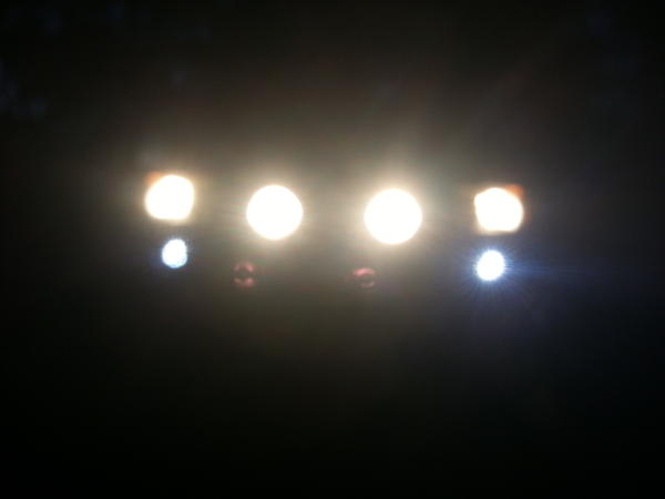 KC waterproof, shockproof, everything proof LED's in SW bumper and 5" Hella rounds installed, light up the night!