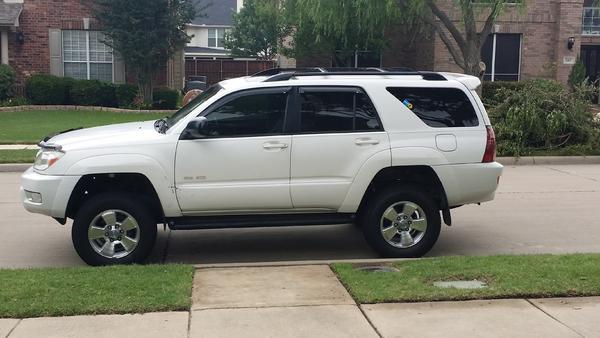 lift b4 new tires
note damage to door and front fender