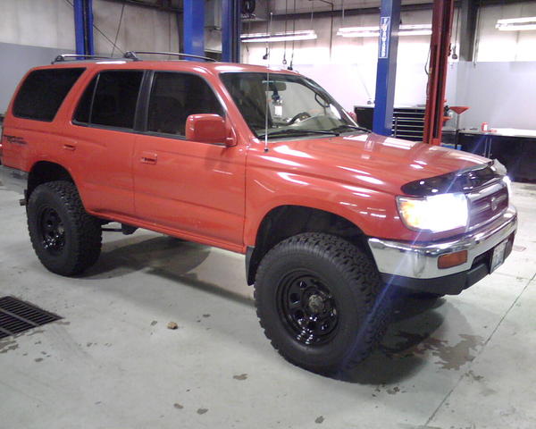 lifted with wheels/tires, hids, and bug deflector
