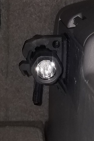Maglite mount trunk panel.