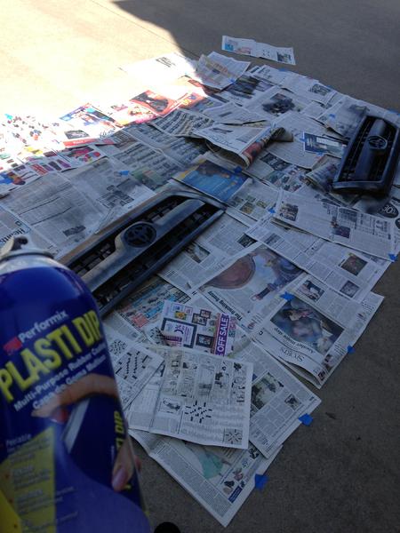 Me and my buddy plasti-dipping our grilles
