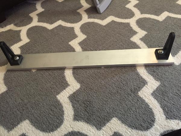 Measuring and drilling the light bar mount.  Just an aluminum bar bought off amazon for $15.  Going to prime it and coat in black truck bedliner.