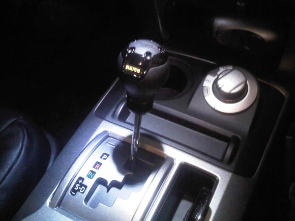 Momo shift knob w/ slight mod so it doesn't sit too tall.