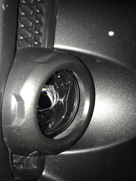 Morimoto installed into position. Notice the large gap between the lens and the housing on the bumper.