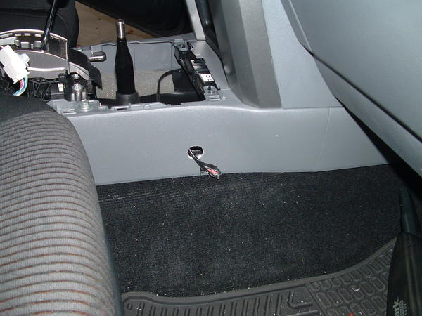 Mounting hole with cable sticking out