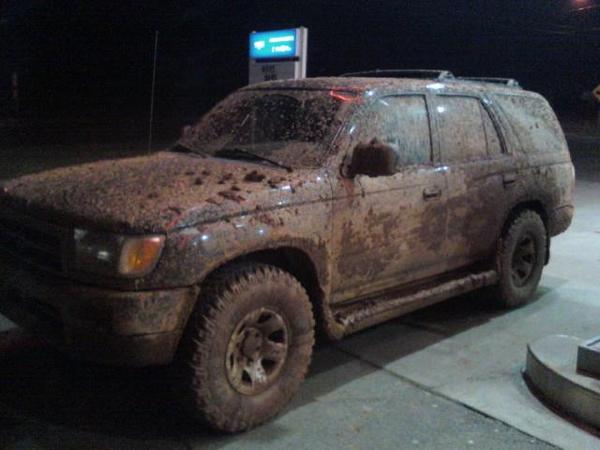 Muddin at night about a week after I got the new 31's.  I also lost a skid plate that night. lol