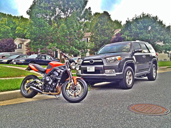My 2 loves.. '09 Triumph Street Triple R in Blazing Orange and '12 Toyota 4Runner SR5 in Magnetic Gray