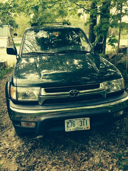 My 2001 Toyota 4Runner sitting in my parking spot. You can't notice it, but there's a crack in the windshield going right over my expectation sticker.