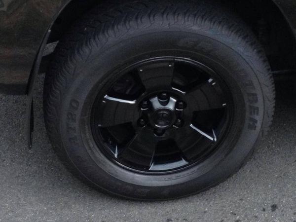 My cousin painted my wheels for the cost of paint and a 12-pack of Heineken.