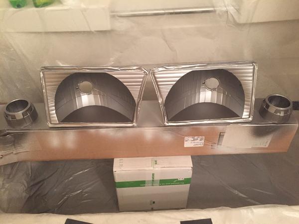 My make shift paint shop. . . plastic trash bags cut open and taped along the guest bathtub.  My fiance is going to whoop me for sure.
