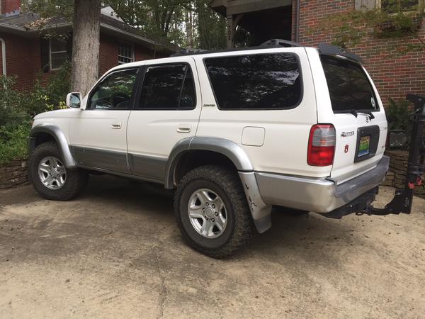 My personal '99 Limited 4wd w/ locker. 906's with 4runner 5100's in rear, stock front suspension. 1" rake. Kinda like it. Love the OME 906's! Rear sag