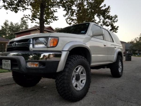 My Runner on 33" , 1.25 Spider T hub centric spacer with 3" Revtek lift.
