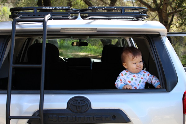 My son hanging out in the trunk area of the 4Runner.