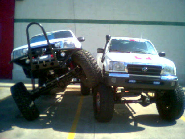My truck parked on one of my buddies trucks a work
