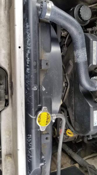 Mysterious Coolant leak in top panel of radiator.
