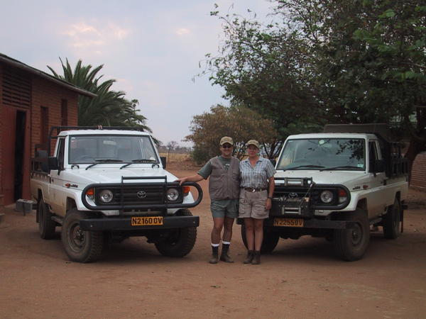 Namibia Africa Safari in 2002 in front of our guides 2 Toyota diesel Land Cruisers. Notice the LC's are NOT SUV's - they are pickups.. .  This is wher