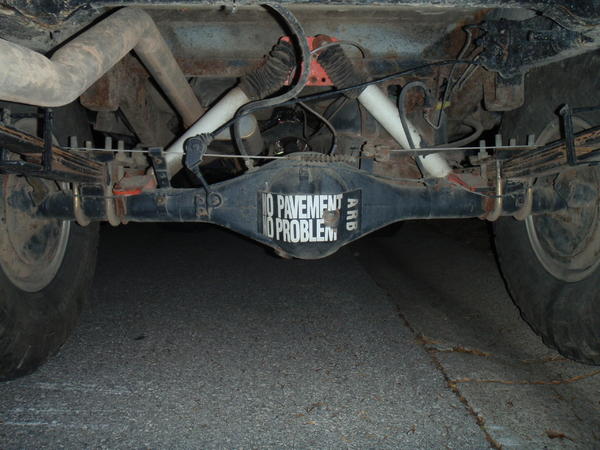 new axle with Budbuilt shock mounts, Pro Comp ES3000 shocks, U-bolts flipped, ARB locker, & diff. armor