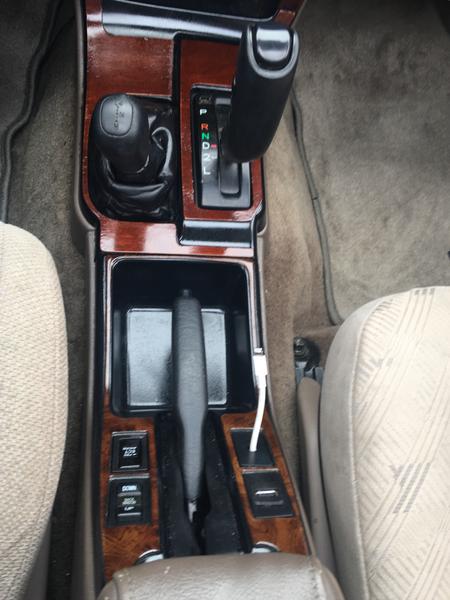 New center console 
Gear shift bezel is SR5 wood restained
