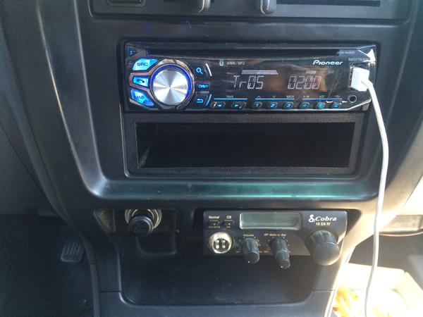 new cobra 19 dx iv mounted in the ashtray spot