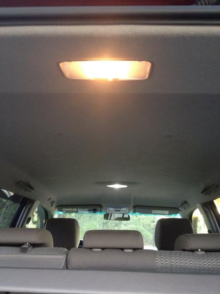 New in front before I installed the larger truck light in front dome. BIG difference! This picture doesn't do it justice.