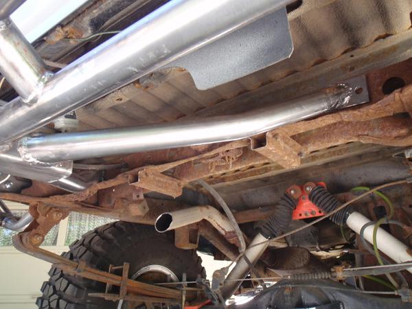 New rear bumper bolts to the old tire carrier crossmember