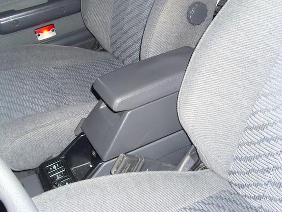 New Stacker 4Runner Center Console. It has 2 compartments the lower will hold 8 CD and the Top console has 4 small compartments which are good for hol