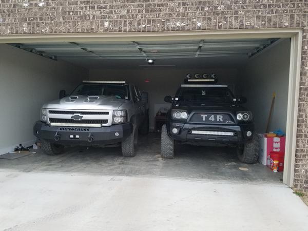 Next to a Silverado 1500 on a 5.5 inch lift