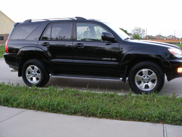 Obviously the passenger side. Nothing special. Then again, you can see here I replaced the end caps of my roof rack with black to match my paint color